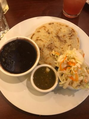 Spinach pupusa/ pinto bean pupusa w/black beans  at Un Solo Sol in Los Angeles