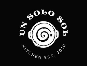 Our beautiful logo in black and white symbolizing our mission as describe in the Sun Solo Sol Mural  at Un Solo Sol in Los Angeles