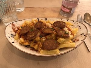 Salchipapas  at Punto Vegano in Madrid