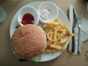 quinoa burger with fries at Punto Vegano in Madrid