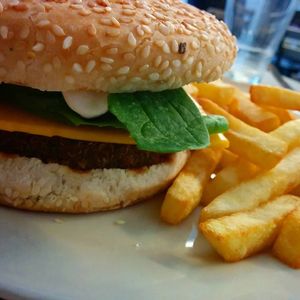 Vegan quinoa burger with vegan cheese at Punto Vegano in Madrid