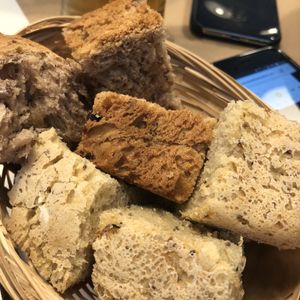 Amazing fresh bread. Nut & raisin, the other courgette, chia & olive   at Punto Vegano in Madrid