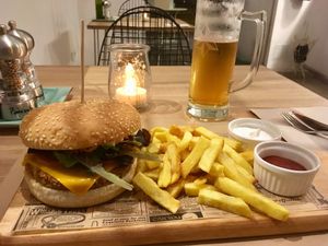 Quinoa burger with fries at Punto Vegano in Madrid