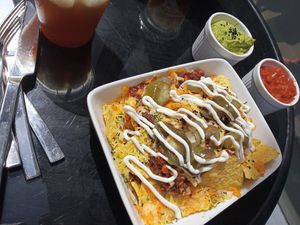 Chilli Cheese Nachos with guacamole and salsa at Vegan Antics in Gravesend