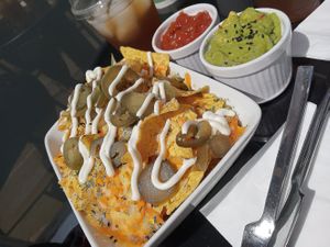Cheese Supreme Nachos with guacamole and salsa at Vegan Antics in Gravesend