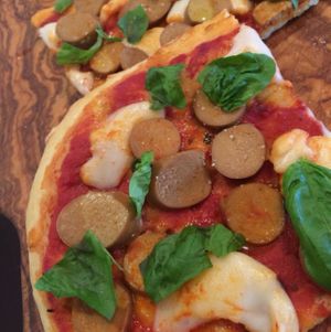 vegan pizza with rice mozzarella and soy würstel  at Pepo's - Gelateria Naturale and Kitchen Lab in Pontedera