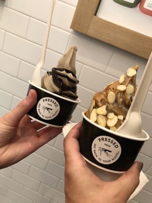 Left: vanilla with cocoa drizzle, right(veg): vanilla with almond & honey  at Pressed Juicery in Hollywood
