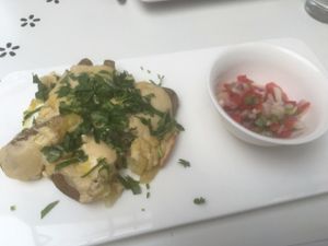 Potato appetizer with cashew/peanut cheese and pico de gallo at Shakti en Chile in Santiago