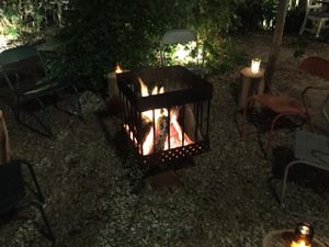 Have a drink at the fireplace at Lucifer in Garzon