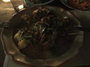 Vegan paradise. Potatoes boiled / baked with coriander / mustard sauce and smoked almonds with rucola. Yummy. at Lucifer in Garzon