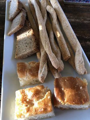 Homemade bread, focaccia, and grissini  at Casa Scaparone in Alba