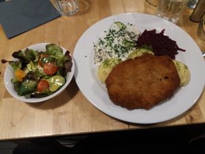 Schnitzel with mash and salad at Lokal Vegan Bistro in Warsaw
