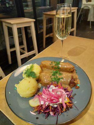 Stuffed seitan rolls and prosecco at Lokal Vegan Bistro in Warsaw