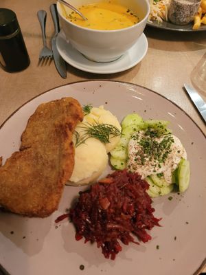 vegan Schnitzel, red cabbage, potatoe mash and cucumber salad. Yum! at Lokal Vegan Bistro in Warsaw