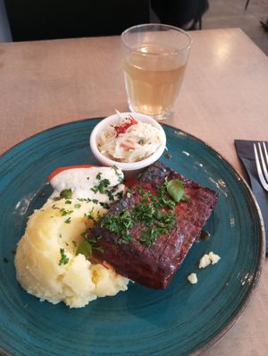 Ribz (seitan) with mashed potatoes and glazed carrots at Lokal Vegan Bistro in Warsaw