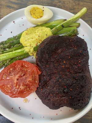 Burned seitan  at Lokal Vegan Bistro in Warsaw