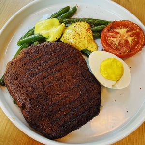 Vegan steak with vegan egg  at Lokal Vegan Bistro in Warsaw