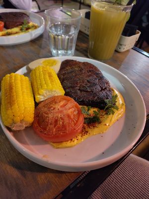 Seitan steak and non-alcoholic mojito at Lokal Vegan Bistro in Warsaw