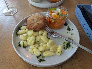 Seitan cutlet with gnocchi and carrot feta salad at Lokal Vegan Bistro in Warsaw