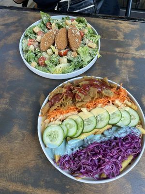 Tęczowe frytki i sałatka cezar at Lokal Vegan Bistro in Warsaw