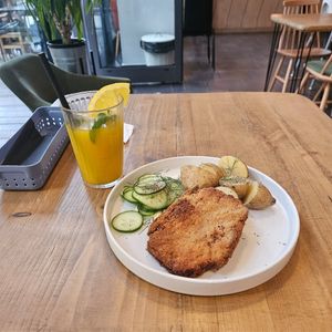 Fried cutlet and mango lemonade at Lokal Vegan Bistro in Warsaw