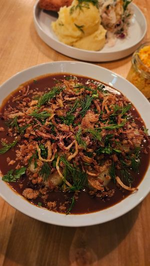 Kluski (hidden under sauce and toppings) 😄 at Lokal Vegan Bistro in Warsaw
