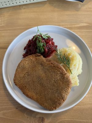 Schabowy (soy-based) with potatoes and beetroot salad at Lokal Vegan Bistro in Warsaw