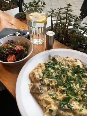  Spaghetti carbonara with smoky ‘bacon’, and side salad at Lokal Vegan Bistro in Warsaw