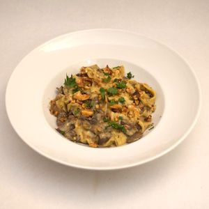 Funghi Pappardelle. House made pappardelle with porcini crème, button mushrooms & walnuts. Vegetarian. at Scarecrow in Auckland