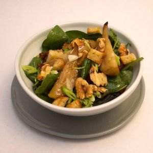 Pear & Walnut Salad. Combining the sweetness of roasted autumn pears with dates, spring onion, crunchy rosemary croutons &amp; walnuts, seeds & soft baby greens.   at Scarecrow in Auckland