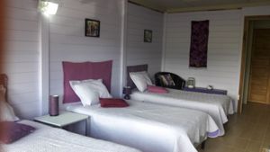 3 single beds bedroom at Puerta de Jade in Alajuela