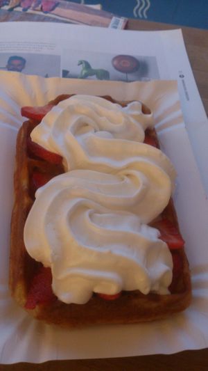 Vegan waffle with strawberries and coconut whipped cream at Sklep z Goframi in Warsaw