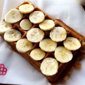 vegan waffle w banana and maple syrup at Sklep z Goframi in Warsaw