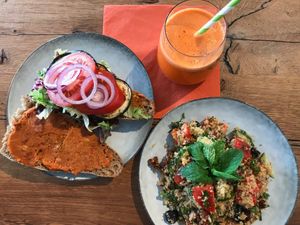Hummus sandwich, vegan couscoussalad and fresh carrot juice. at Fresh Cooked in Maastricht