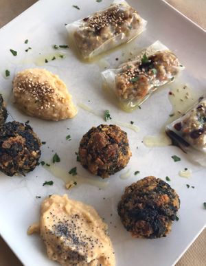 Rice rolls with vegetables, tofu, ginger and soy and Spinach patties with tofu, ginger, curry and a special sauce to replace humus cause I’m allergic   at Sanus in Fuerteventura