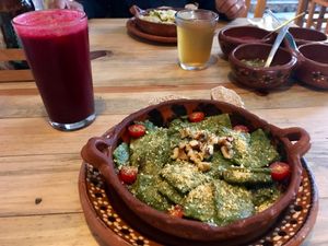 Vegan ravioli with pesto sauce and “Parmesan” cheese at La Colmena in San Andres Cholula