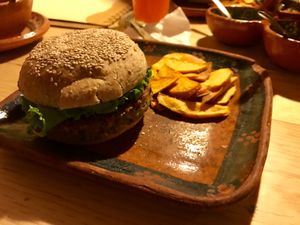 Garbanzo burger and sweet potato fries. So delicious! at La Colmena in San Andres Cholula