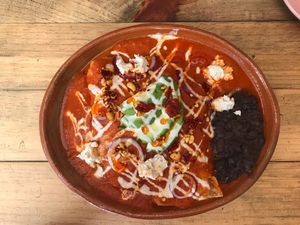 Enchiladas suizas con queso de papa for breakfast. 👍 at La Colmena in San Andres Cholula