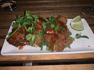 Chicken skewers with coriander and chilli  at Bodhi in Sydney