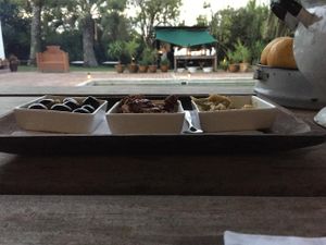 Smoked walnuts with babaganus smoked aubergines sauce at Garzon Restaurant in Garzon