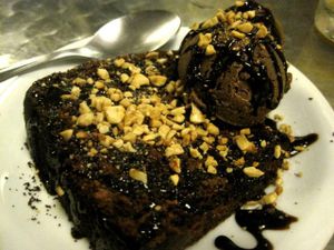 Chocolate cake with ice cream. The ice cream is delicious, but the cake could be improved upon. Anyhow, chances are you won't find many vegan cakes in Brazil, so order it anyway! =) at Vegetariano Social Clube Delivery in Rio De Janeiro