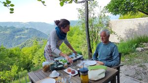 Breakfast served at the table at Eco Rooms Slovenia in Sela Nad Podmelcem