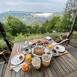 Breakfast with crazy views. at Eco Rooms Slovenia in Sela Nad Podmelcem