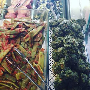 tomato taccole and spelt balls with veggies at Giumella in Florence