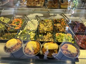 Some of the many amazing dishes - vegan lasagne and quiche in the background  at Giumella in Florence