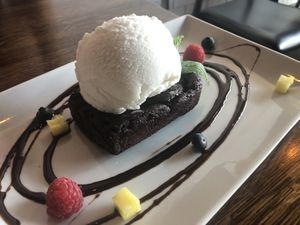 Decadent “Brownie with coconut ice cream”. That’s so rich, thick and sweet: perfect for desert lovers!  at H.O.P.E. in Studio City
