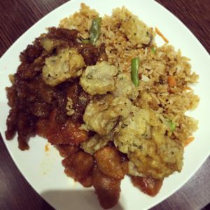 Rice, sweet and sour balls, bbq seitan and battered mushrooms.  at 96 Zen Etterem in Budapest