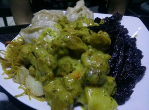 Curry soy, barbecue seitan and veggie dumplings with potatoes and noodles at 96 Zen Etterem in Budapest