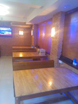 New interior is great complement to great food!
The design and brickwork with the wood benches is warm and calming and makes this a nice sit down restaurant. at Guptaji Ki Kitchen in Bangkok