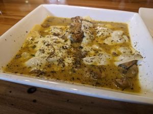 Mushroom topped with vegan cheese at Amaranto in Guayaquil